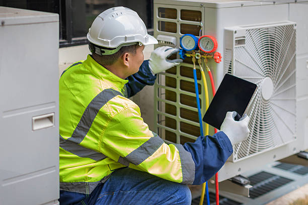 Professional Air Duct Cleaning technician working in Elsah, IL